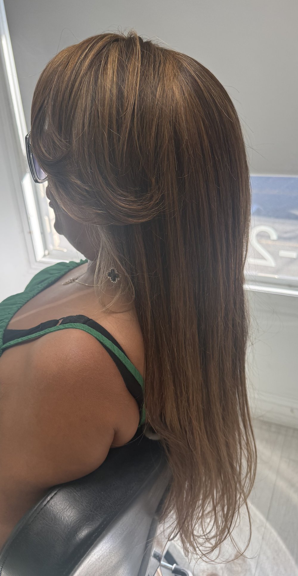 Caramel highlights sleek — Lush Atelier Beauty Salon