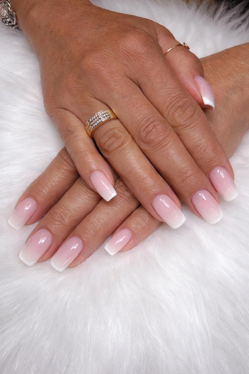 Pink ombre gel nails at Lush Atelier